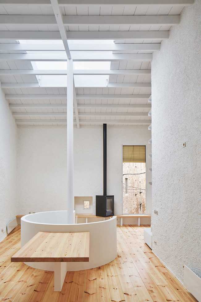 house interior with central spiral staircase