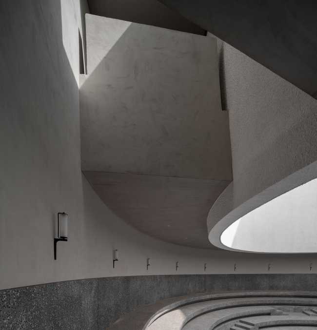 art center structure concrete blocks amphitheater circular opening