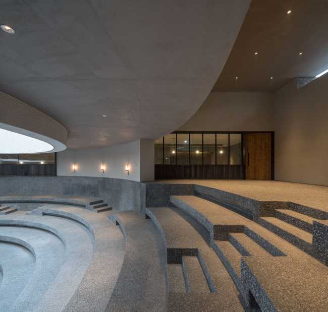 art center structure concrete blocks amphitheater circular opening