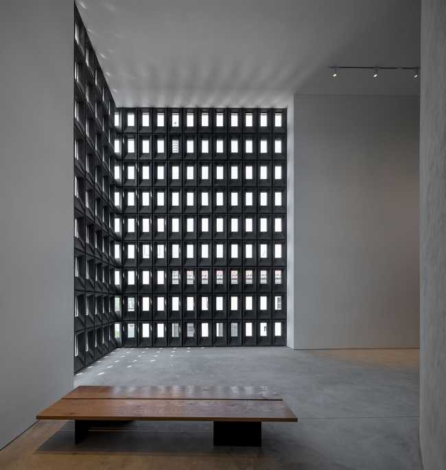 art center structure concrete blocks amphitheater openings facade