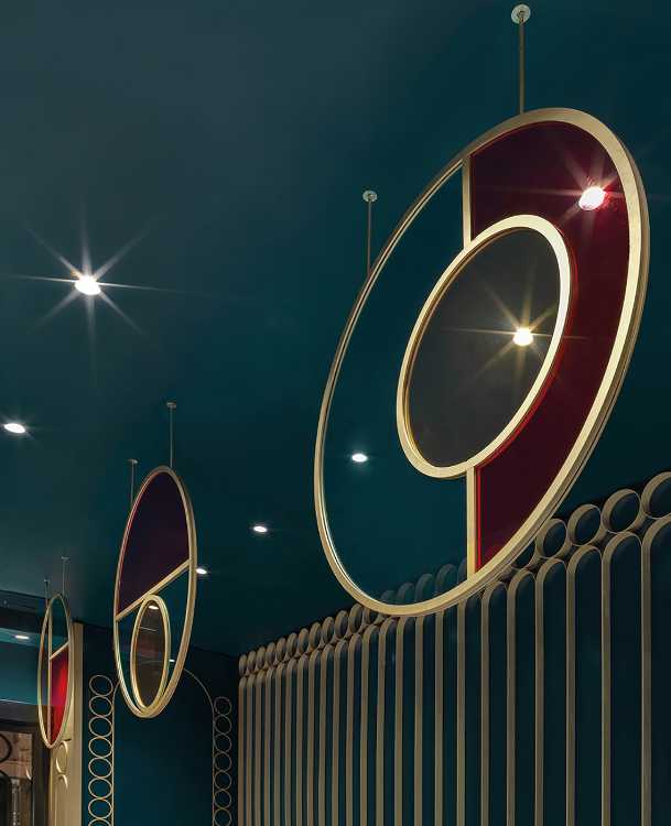 Circular decorations hanging from the Lion restaurant ceiling