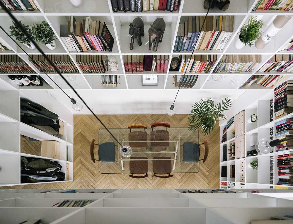 double volume dining area bookcase