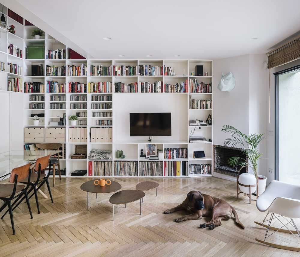 double volume dining area bookcase