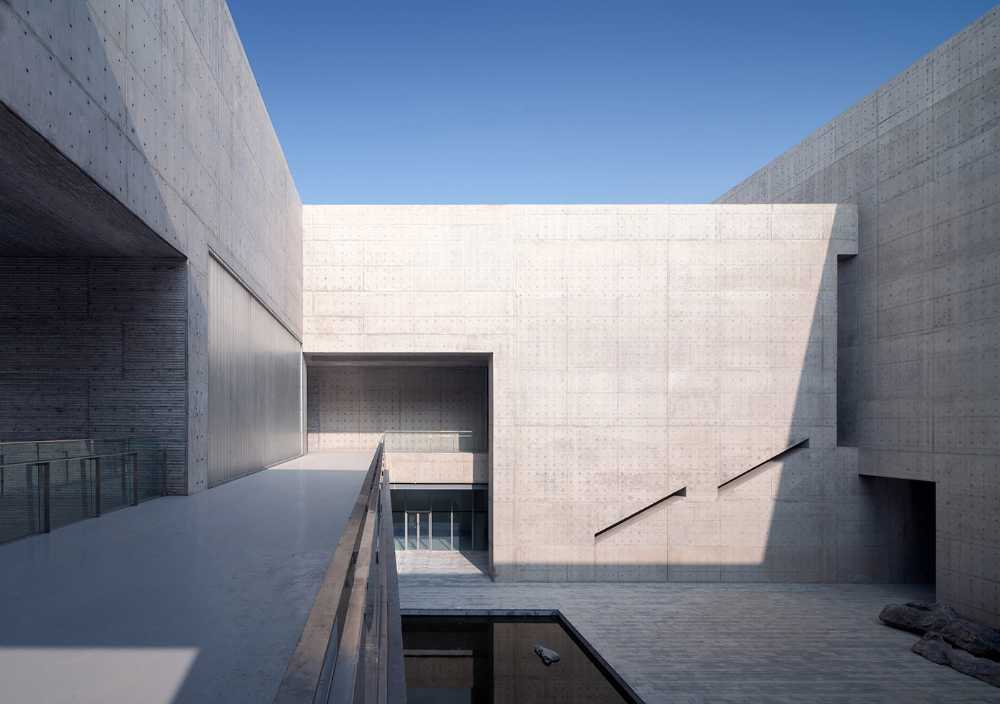 centro culturale struttura cemento ingresso lago