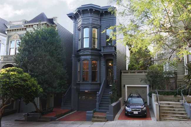 Dark facade Victorian house