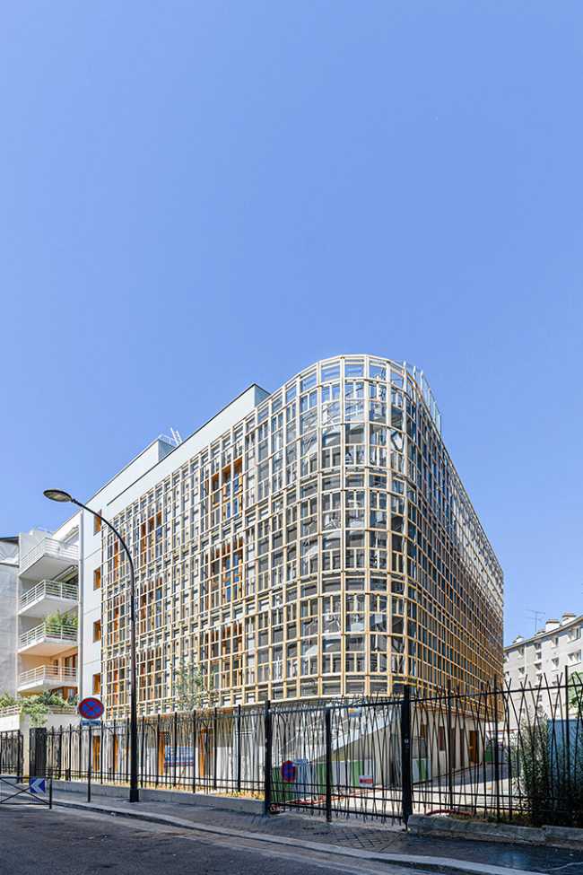 Wooden net surrounds the building