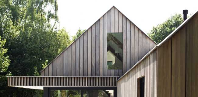 Gable facade for a wooden cabin in the woods