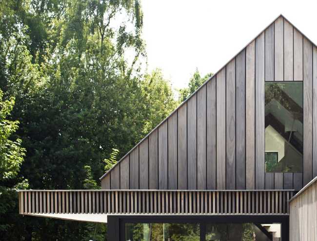 Gable facade for a wooden cabin in the woods