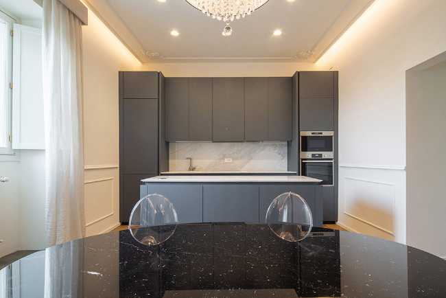 Kitchen with black marble table