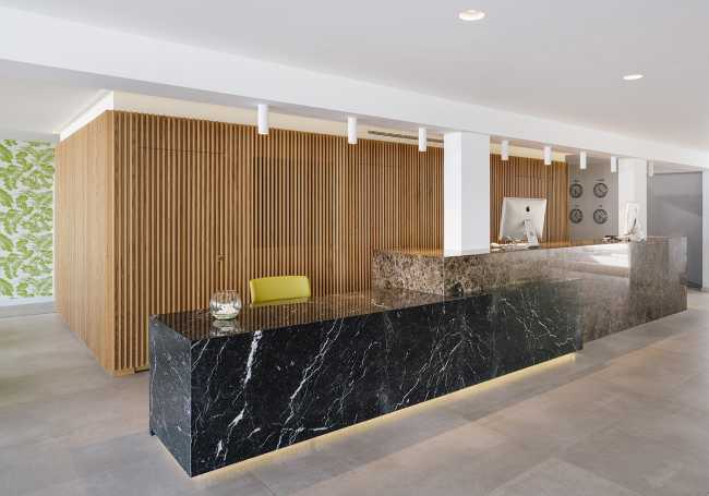 resort reception stone wood cladding