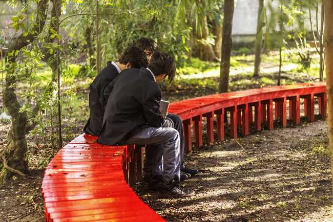 Red wooden bench