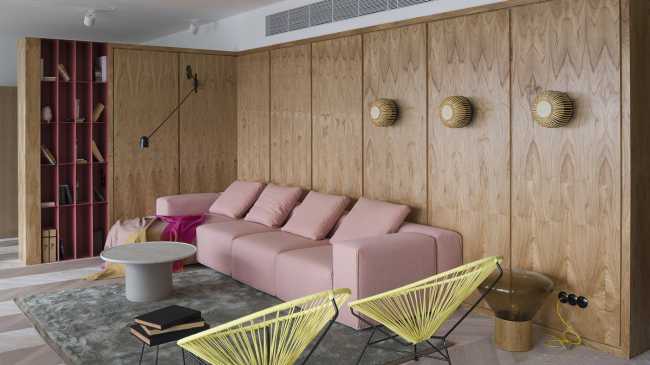 sofa pink wood paneling