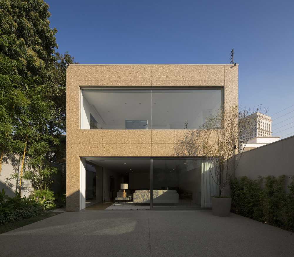 Comfort and privacy in a dense urban setting. Perforated metal panels ...