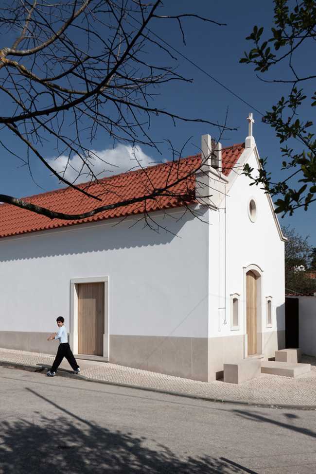 White-walled chapel and tiled roof