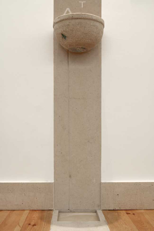 Holy water font in marble