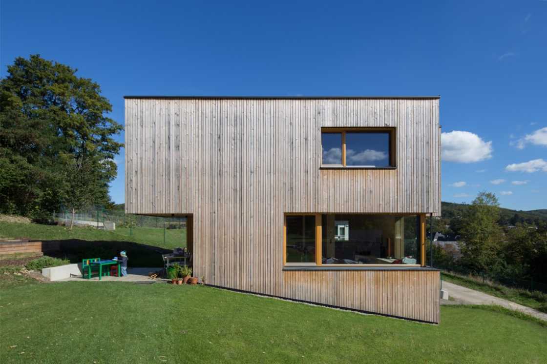 Wooden house with compact design