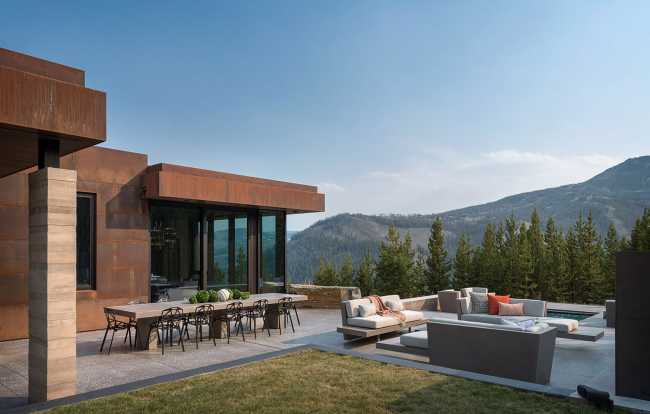 Villa with concrete structure and corten cladding