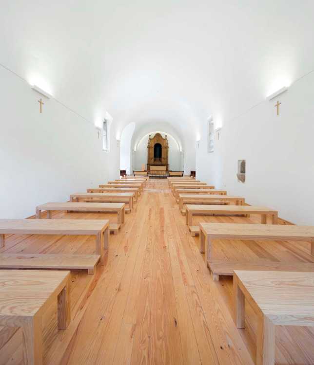 White chapel interior with parquet