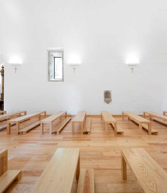 White chapel interior with parquet