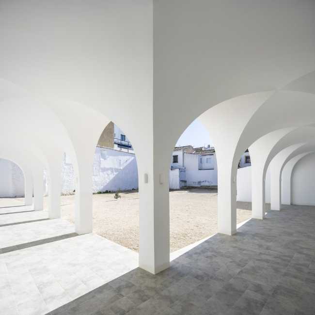 Enlarged parish offices. Perfect square courtyard with geometric rigour