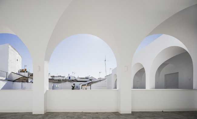 Enlarged parish offices. Perfect square courtyard with geometric rigour