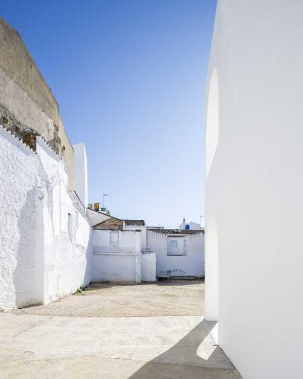 Enlarged parish offices. Perfect square courtyard with geometric rigour