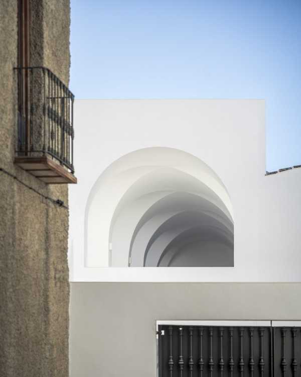 Enlarged parish offices. Perfect square courtyard with geometric rigour