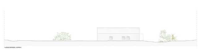 Mediterranean house situated between ploughed fields and stones. Ecological habitat in Spain