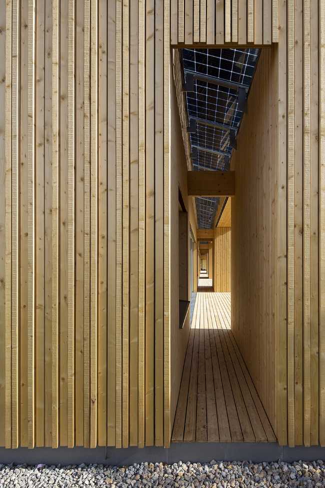 Passaggio edificio in legno