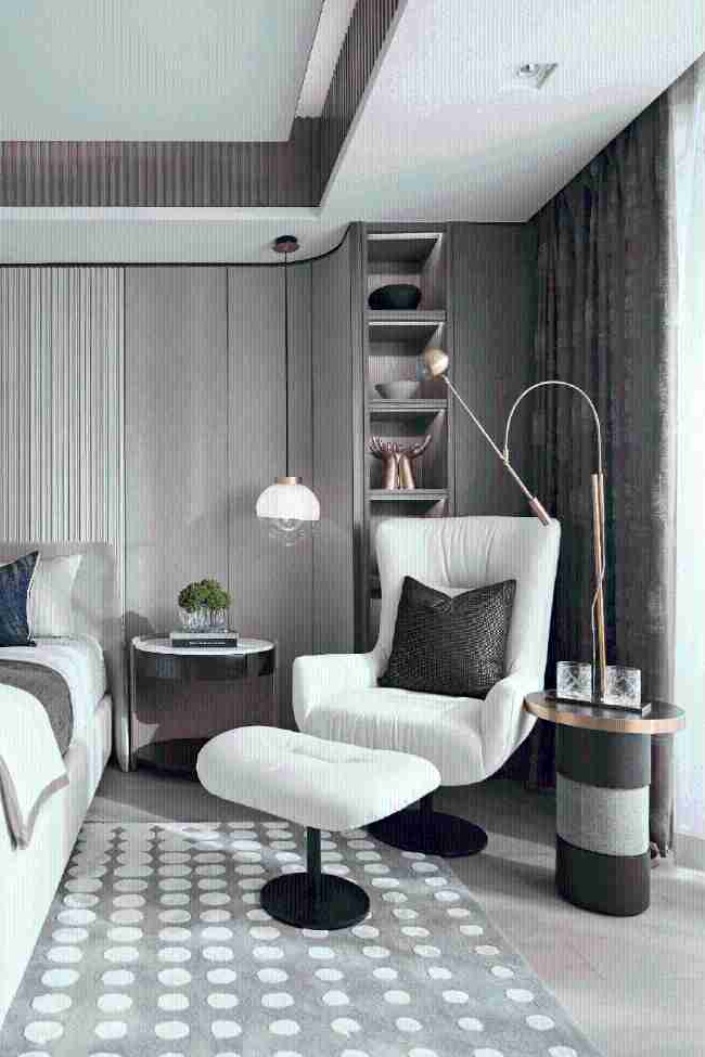 Appartamento con vista sulla baia in cina - poltrona camera da letto